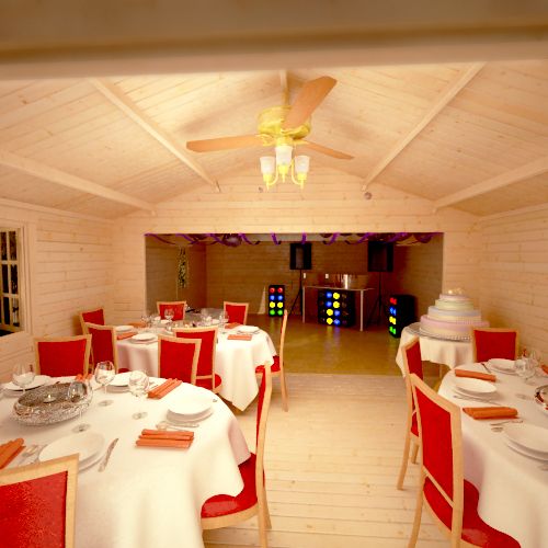 Interior of 44mm log cabin set up to host an event, featuring DJ, balloons and party tables.
