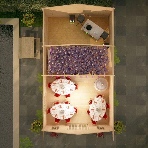Ariel view of 44mm log cabin set up with party tables, balloons and DJ.