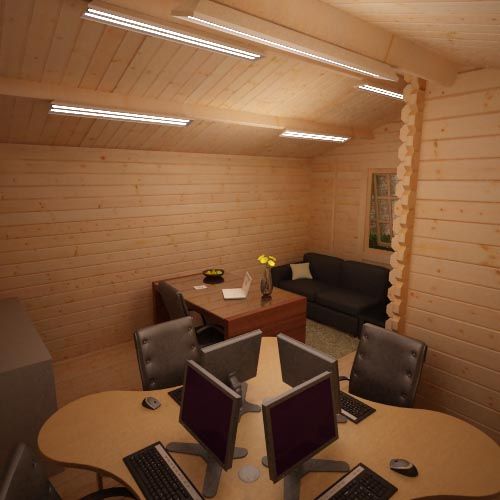 Interior view of 44mm log cabin being used as an office space with desks, chairs and computers.