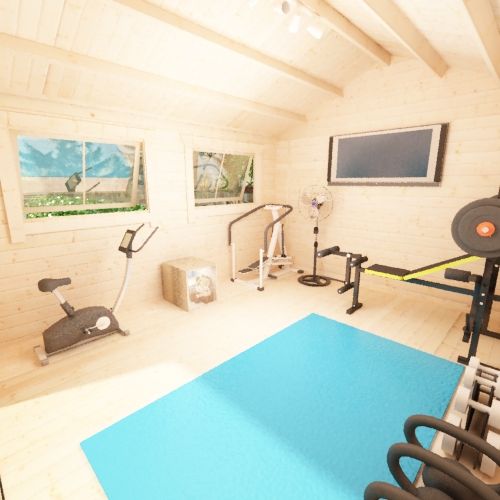 Interior of 28mm log cabin with gym equipment such as weights, bike machine and blue mat.