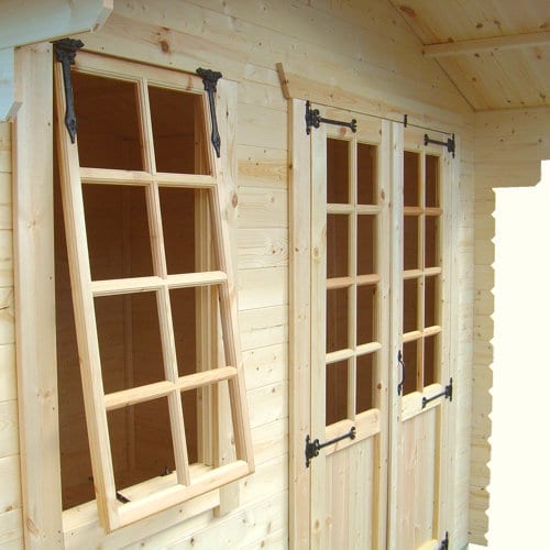 Double doors and open window in a 19mm log cabin with apex roof.