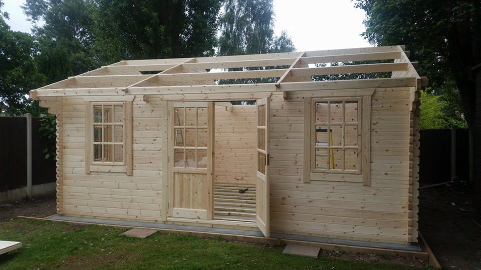 Log cabin roof under construction.