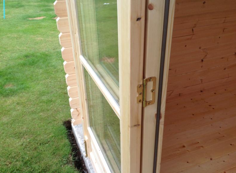 Close up of window glazing option on a log cabin.